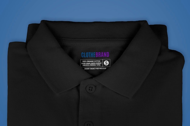 Folded black polo shirt label