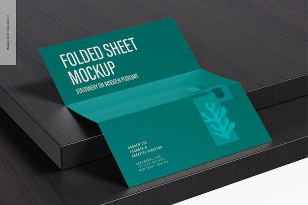 Folded sheet on wooden podiums mockup, leaned