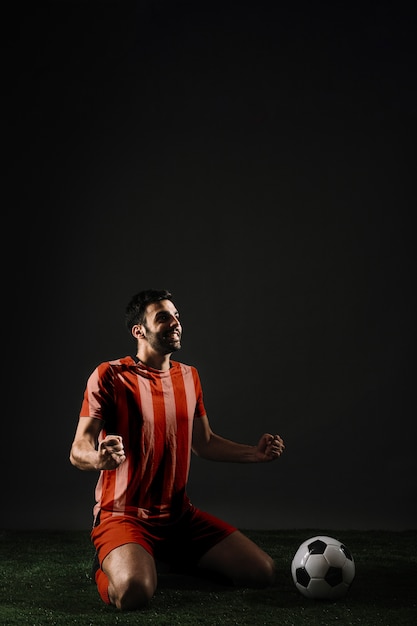 football player celebrating