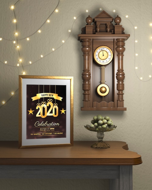 Frame beside watch on wall with new year theme