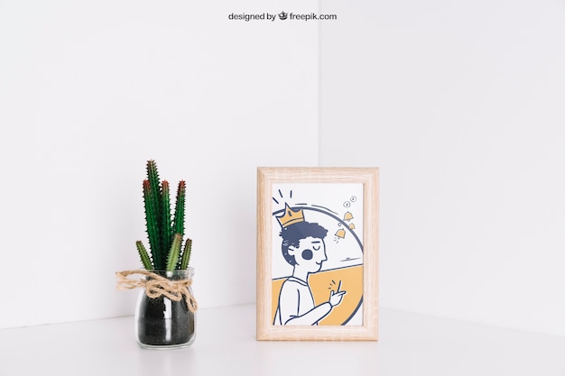 frame next to cactus