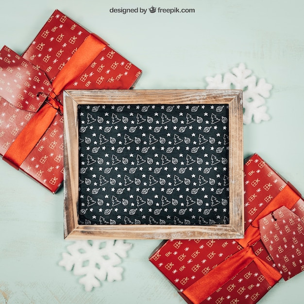 PSD frame and gift boxes mockup with christmtas design