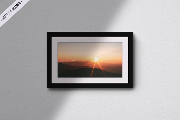 Frame mockup isolated in living room interior