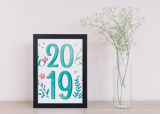 Frame mockup with floral decoration