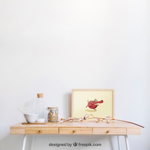 PSD frame mockup on wooden desk