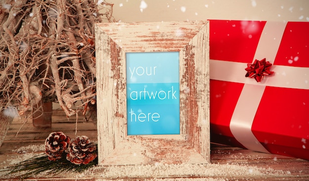 PSD frame with christmas gift mockup