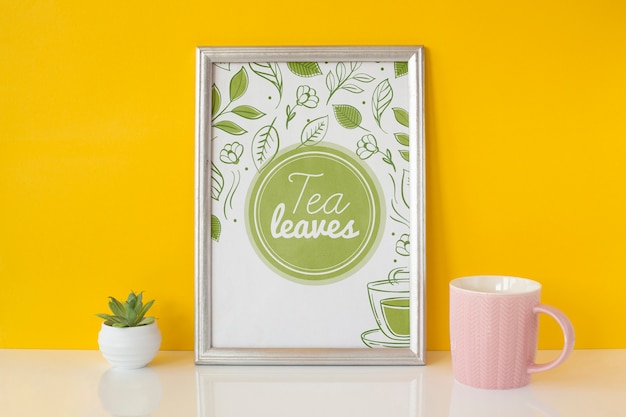 Frame with tea leaves concept