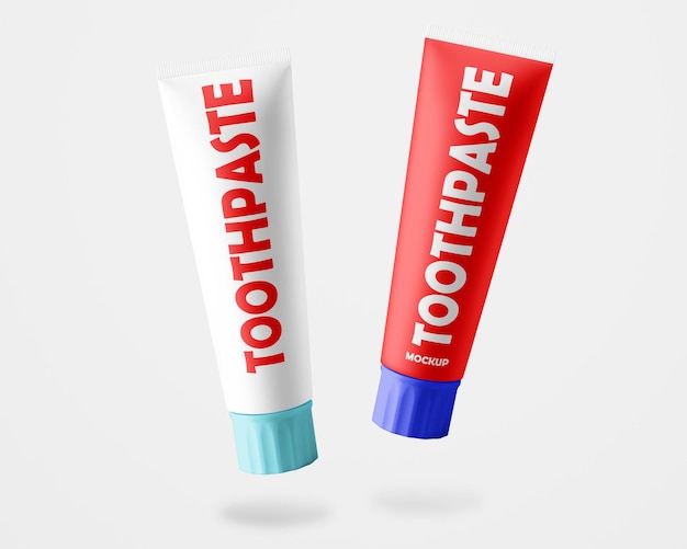 PSD Бесплатный макет psd двух тюбиков зубной пасты с синими крышками с надписью «зубная паста»