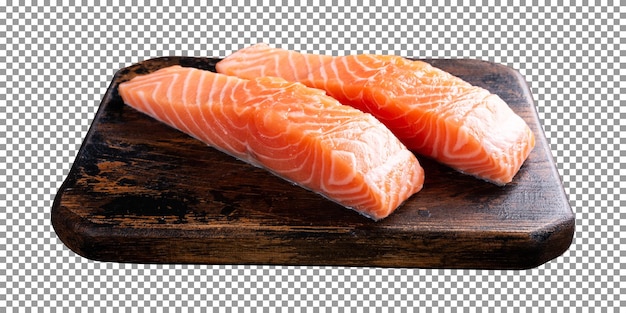 PSD fresh raw salmon pieces on wooden board with transparent background