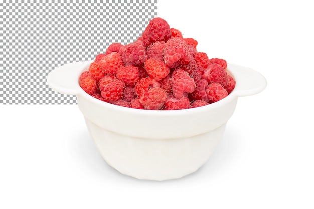 Fresh ripe raspberries in a white bowl side view isolated on a transparent background