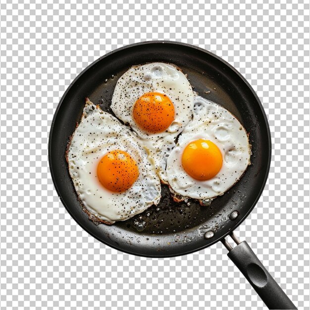 Fried eggs in the new nonstick frying pan on white background