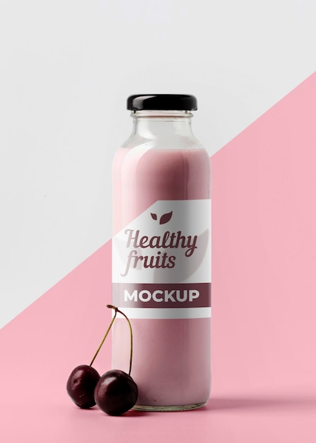 PSD front view of clear juice bottle with cherries