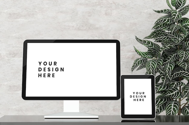 PSD mockup di schermo desktop e tablet con vista frontale sul tavolo