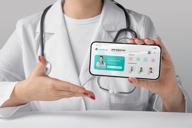 Premium PSD | Front view doctor holding device mockup