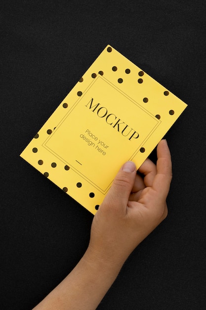 front view of elegant birthday card held by hand