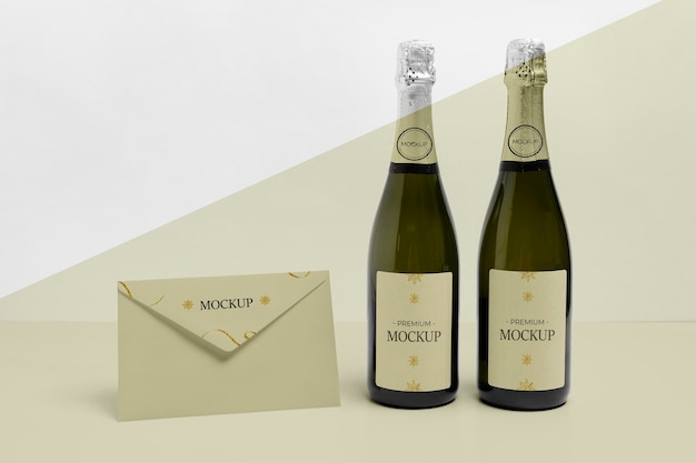 PSD front view envelope and champagne bottles mock-up