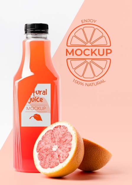 PSD front view of grapefruit juice glass bottle with cap