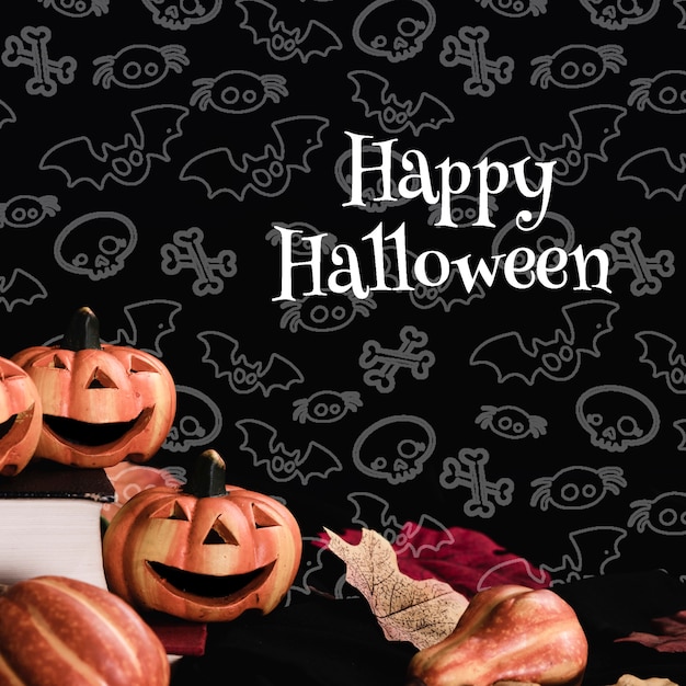 front view of halloween pumpkins with black background