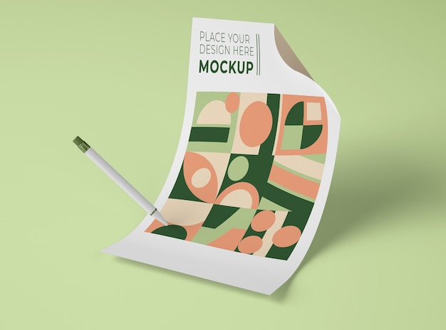 front view of mock-up paper with geometric shapes and pen