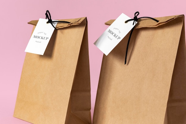 Front view of paper shopping bag mock-up with paper tag