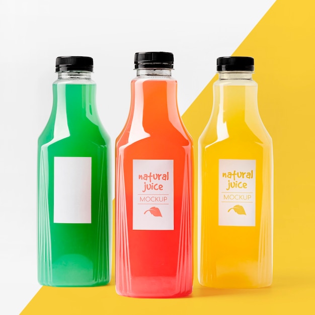 PSD front view of selection of clear juice bottles