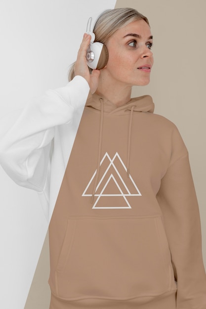 PSD front view of stylish woman in hoodie with headphones