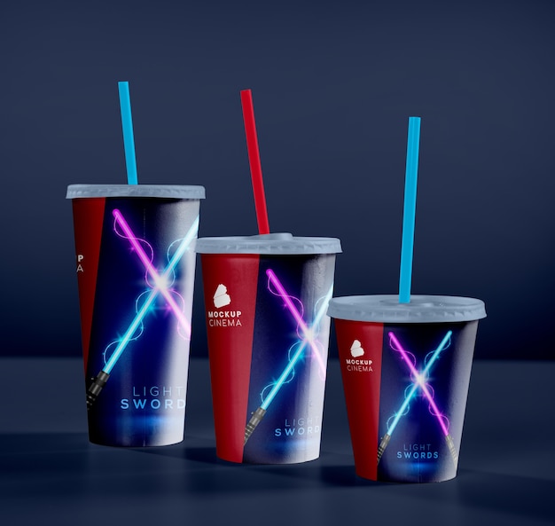 PSD front view of three cinema cups with straws