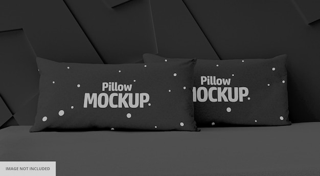 Front view of Two Black Pillow Mockup on bed
