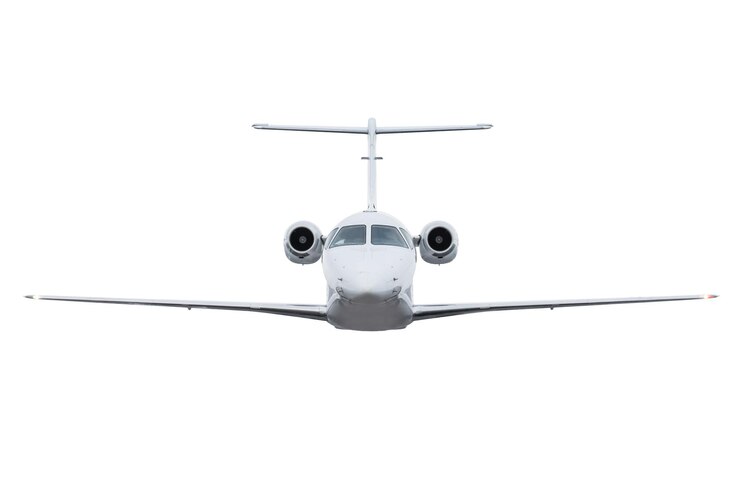 PSD front view of the white corporate business jet flying isolated