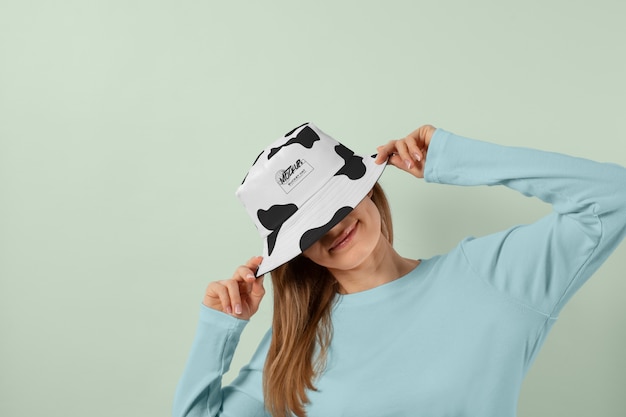 PSD front view woman posing with bucket hat