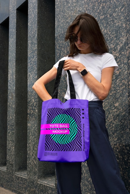 Front view woman posing with tote bag