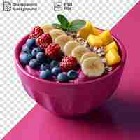 PSD fruity acai bowl with blueberries raspberries and bananas on a pink table accompanied by a green leaf and a dark shadow