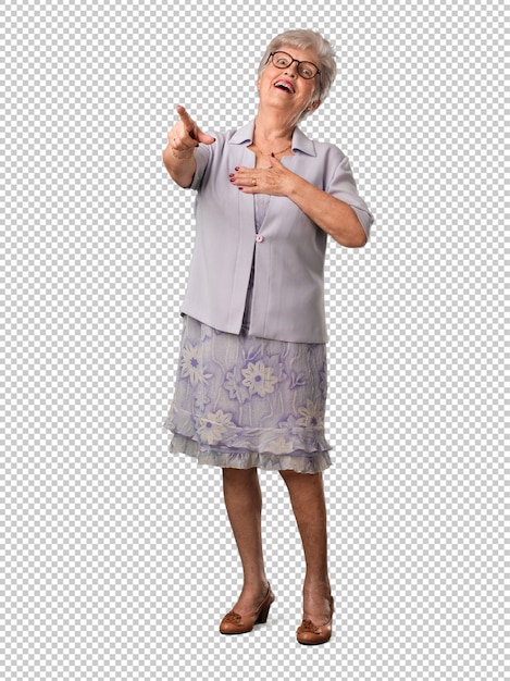 Full body senior woman shouting, laughing and making fun of another