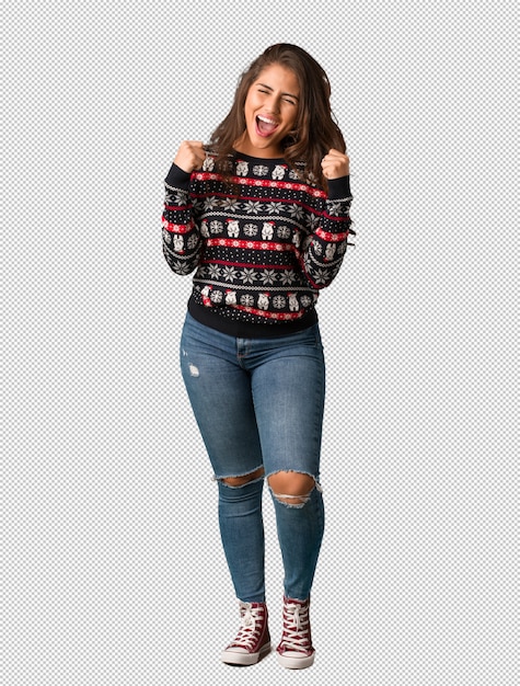 PSD full body young woman wearing a christmas jersey screaming very angry and aggressive