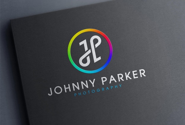 PSD full color logo mockup on black paper