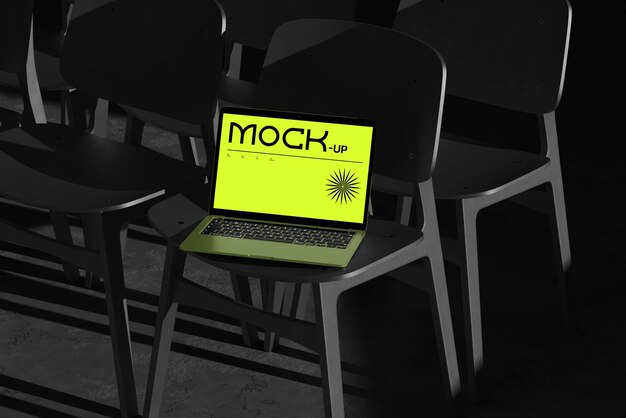 PSD full editable laptop mockup with chair background