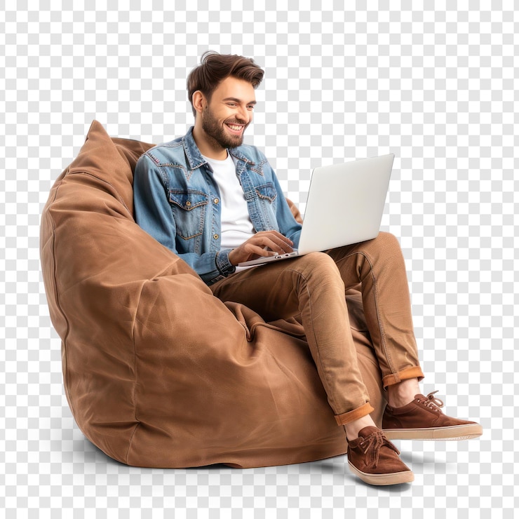 PSD full length happy young man sit in bag chair unboxing new laptop on transparency background psd