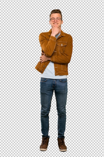 A full length shot of a Blonde handsome man with glasses and smiling
