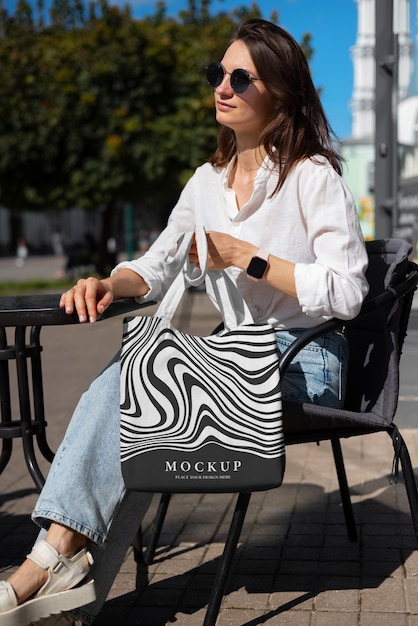 PSD full shot woman with optical print tote bag