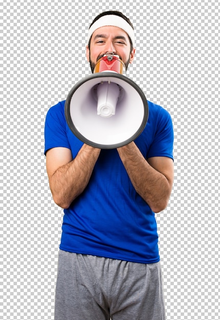 Funny sportsman holding a megaphone