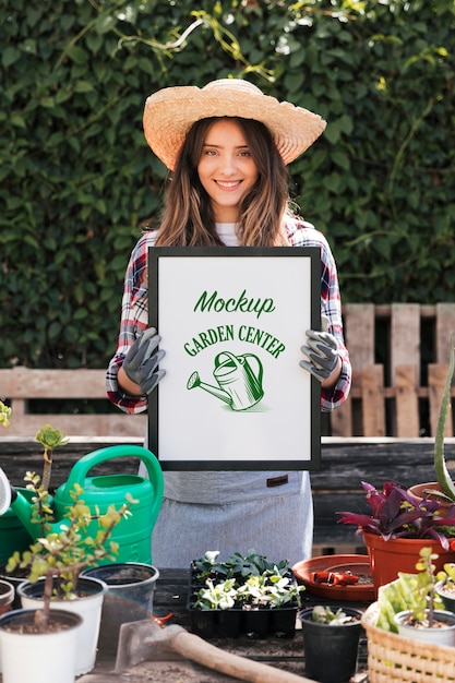 PSD gardener holding mock-up sign