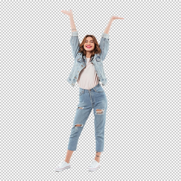Gelukkige vrouw in denim die plezier heeft over een witte muur.