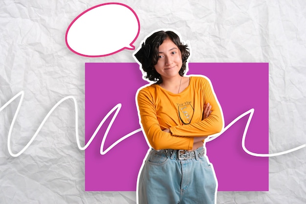girl on a background makes expressions she is crossing her arms and with a smile on her face
