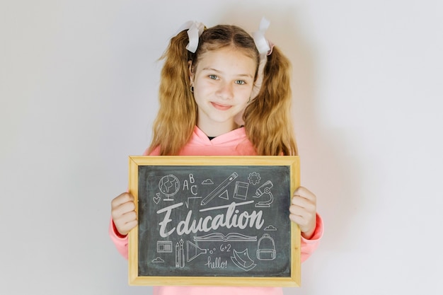 PSD girl holding slate mockup