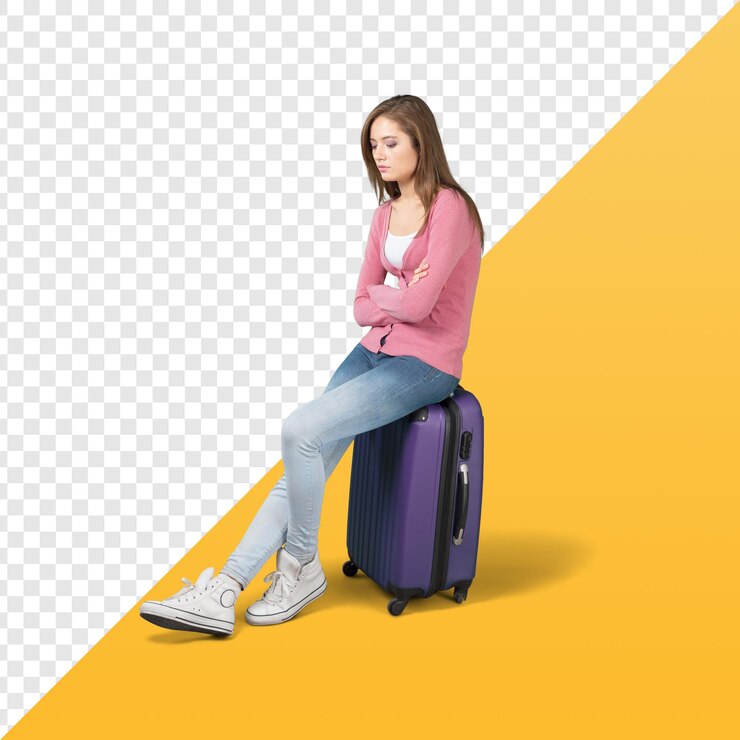 PSD girl sits on a suitcase