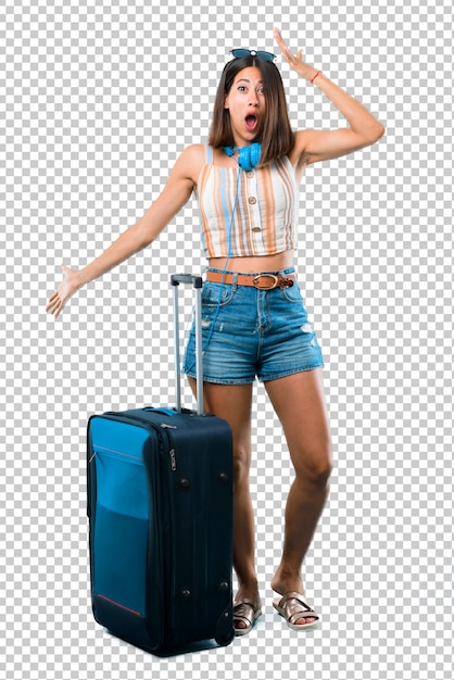 PSD girl traveling with her suitcase with surprise and shocked facial expression