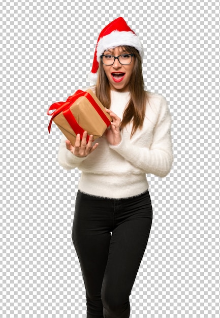 PSD girl with celebrating the christmas holidays holding gift boxes in hands