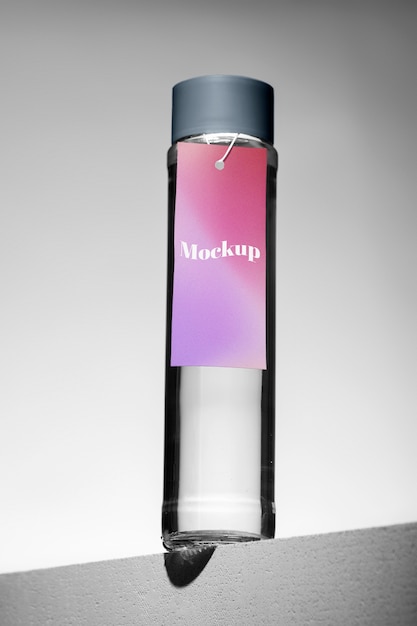 PSD glass bottle with tag mockup design