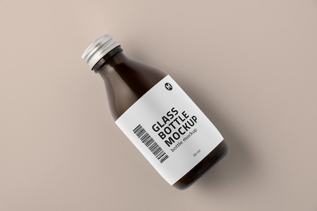 glass bottle with tag mockup