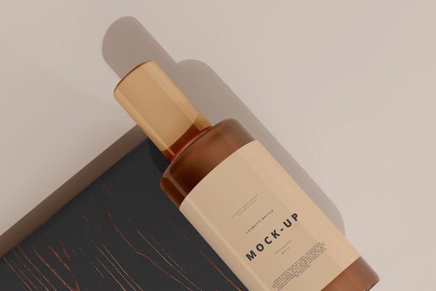 Mockup di bottiglia cosmetica in vetro